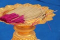 Incense sticks were deposited in a bowl (Thailand)