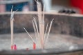Incense sticks that were lit in order to pay respect to the gods. Soft focus,motionblur