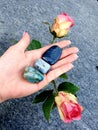 Incense with two Roses and 3 gemstones blue gems stones rocks flowers Royalty Free Stock Photo