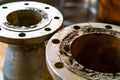 A 4-inch and 6 inch Duplex pipe with a severely corroded flange awaiting replacement. Royalty Free Stock Photo