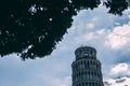 INCLINE Pisa tower from many different perspectives, duomo, blue sky with clouds, sun flare, wide angle photo, bottom and side vie