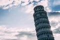 INCLINE Pisa tower from many different perspectives, duomo, blue sky with clouds, sun flare, wide angle photo, bottom and side vie