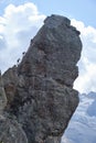 Inclined rock tower on via ferrata Delle Trincee meaning Way of the trenches, Padon Ridge, Dolomites mountains, Italy.