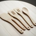 Included are two flat spatulas two slotted turners and a spoon Royalty Free Stock Photo
