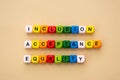 Inclusion, acceptance and equality words made from colorful wooden cubes. Inclusive and tolerance social concept, flat lay
