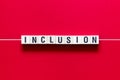 Inclusion - word concept on cubes