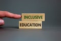 Inclusive education symbol. Wooden blocks form the words 'inclusive education'