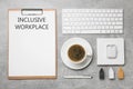 Inclusive workplace. Flat lay composition with clipboard, coffee and keyboard on grey table Royalty Free Stock Photo