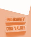 Inclusivity and core values words written on wooden blocks. Social and business concept Royalty Free Stock Photo