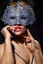 Incognito woman in ancient style mask Royalty Free Stock Photo