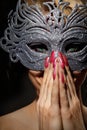 Incognito woman in ancient style mask Royalty Free Stock Photo