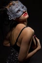 Incognito woman in ancient style mask Royalty Free Stock Photo
