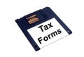 Income Tax forms on floppy disk Royalty Free Stock Photo