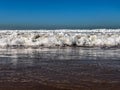 Incoming tide on sand beach, Atlantic Ocean, Agadir, Morocco Royalty Free Stock Photo