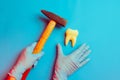 Unprofessional Dentist Holding a Hammer Hitting Tooth