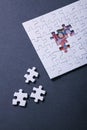 Incomplete jigsaw puzzle. Conceptual image