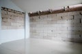 Incomplete renovation room show joints of brick, building to be the wall before plastering. Royalty Free Stock Photo