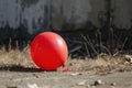 Incongruous Air balloon deflated in nature field. Generate Ai Royalty Free Stock Photo