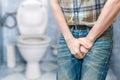Incontinence Concept. Man Wants To Pee And Is Holding His Bladder