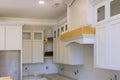 Incorporating modular kitchen cabinets into a new house construction Royalty Free Stock Photo