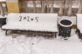 Incorrectly resolved mathematical example recorded on a snow