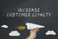 Increase customer loyalty concept on blackboard