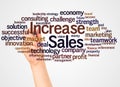 Increase Sales word cloud and hand with marker concept