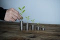 Increasing growth coins stacking with plant Royalty Free Stock Photo
