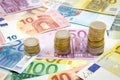 Increasing stacks of euro coins