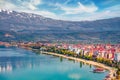 Incredibl spring cityscape of Pogradec town. Wonderful outdoor scene of Ohrid lake. Royalty Free Stock Photo