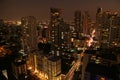 Incredible Aerial View of Cityscape with Skyscrapers of Bangkok Downtown at Night