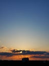 Incredible blue and golden sunset landscape heavy clouds