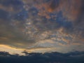 incredible blue and golden sunset landscape heavy clouds