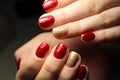 An incredible glow under red stained gel polish Royalty Free Stock Photo