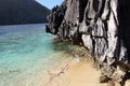 Incredible golden sand and transparent waters of Matinloc Royalty Free Stock Photo