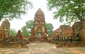 Incredible Group of Buddha Images Ruins in Wat Mahathat Temple or the Monastery of the Great Relic in Ayutthaya, Thailand