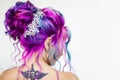 Incredible hair color, bright blue and Magenta gradient. Stylish fashionable hair coloring.