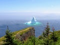 Incredible iceberg floating along the rugged coast beside the Sk Royalty Free Stock Photo