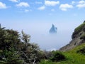 Incredible iceberg floating along the rugged coast beside the Sk Royalty Free Stock Photo