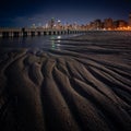 Incredible interesting and beautiful Chicago cityscape skyline at night with gorgeous foreground meandering patterns of ridges and Royalty Free Stock Photo