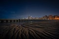 Incredible interesting and beautiful Chicago cityscape skyline at night with gorgeous foreground meandering patterns of ridges and Royalty Free Stock Photo