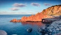 Incredible marine scenery. Colorful evening view of Red Rocks Beach, Arbatax