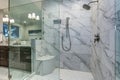 Incredible master bathroom with Carrara marble tile surround. Royalty Free Stock Photo