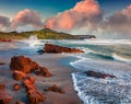 Incredible morning view of Capo San Marco Lighthouse on Del Sinis peninsula. Fantastic summer sdunrise on Sardinia, Italy, Europe. Royalty Free Stock Photo