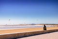 Incredible Morocco, amazing Essaouira, a beach with people engaged in Kite Surfing