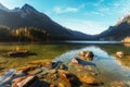 Incredible Nature scenery of Bavarian Alps. Impressive Hintersee Lake of Sunny Day. Awesome Alpine lake under sunlight