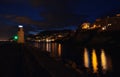 Incredible night view of the seaside town of Camogli with lights, colors and reflections in a magical atmosphere