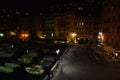 Incredible night view of the seaside town of Camogli with lights, colors and reflections in a magical atmosphere