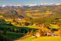 Incredible scenic view of traditional tyrol village with churches in alpine valley at autumn sunny day