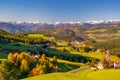 Incredible scenic view of traditional tyrol village with churches in alpine valley at autumn sunny day. Italy Royalty Free Stock Photo